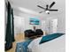 The spacious bedroom offers two black chairs and a large closet for ample storage at 4114 Rutgers Ave, Charlotte, NC 28206