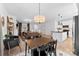 Open floor plan with view from dining area to the kitchen and living room at 4114 Rutgers Ave, Charlotte, NC 28206