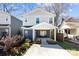 Charming two-story home featuring a welcoming front porch and beautifully landscaped front yard at 4114 Rutgers Ave, Charlotte, NC 28206