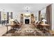 Bright living room with a fireplace, plush seating, and stylish decor at 4114 Rutgers Ave, Charlotte, NC 28206