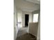 Upstairs hallway with hardwood floors and views into other rooms at 423 Rocky Brook Dr, Shelby, NC 28150