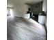 Spacious living room and kitchen featuring hardwood floors and modern appliances at 423 Rocky Brook Dr, Shelby, NC 28150