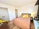 Bright bedroom with hardwood flooring, neutral walls, and a comfortable bed setting for relaxation at 4342 Valeview Ln, Charlotte, NC 28269