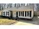 Charming one-story home with white siding, black shutters, and well-maintained landscaping at 4342 Valeview Ln, Charlotte, NC 28269