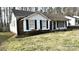Charming one-story home featuring a brick and siding exterior and manicured lawn at 4342 Valeview Ln, Charlotte, NC 28269