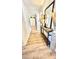Inviting hallway with wood floors, decorated console table, and large mirror creating a spacious feel at 4342 Valeview Ln, Charlotte, NC 28269