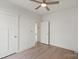 Bedroom showcasing floors, ceiling fan, and ample space at 501 Everette St, Monroe, NC 28112