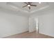 Bedroom featuring trey ceilings, floors, a ceiling fan, and ample space at 501 Everette St, Monroe, NC 28112