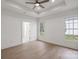 Bedroom featuring trey ceilings, floors, a ceiling fan, and ample light at 501 Everette St, Monroe, NC 28112