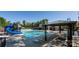Community pool featuring a slide, lounge chairs, and shade at 6141 Abergele Ln, Matthews, NC 28104