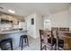 View of the kitchen with granite countertops and stainless appliances at 6374 Windsor Gate Ln, Charlotte, NC 28215