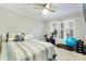 Functional bedroom featuring exercise equipment and a ceiling fan for a healthy lifestyle at 667 Portside Dr, Davidson, NC 28036
