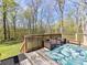 Inviting backyard deck with planter boxes and bench seating offering a serene outdoor experience at 7507 Reedy Creek Rd, Charlotte, NC 28215