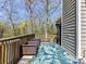 Comfortable backyard deck with planters, bench seating, and a relaxing outdoor space at 7507 Reedy Creek Rd, Charlotte, NC 28215