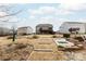 Gently sloping backyard with terraced garden beds leading up to the house with multiple decks at 8828 Powder Works Dr, Huntersville, NC 28078