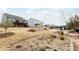 Large backyard featuring landscaped garden beds, a fire pit, and multiple decks, offering plenty of space at 8828 Powder Works Dr, Huntersville, NC 28078