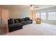 Spacious living room with plush seating and natural light at 8828 Powder Works Dr, Huntersville, NC 28078