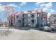Attractive condo buildings with unique architectural elements, set in a well-maintained community with convenient parking at 9035 J M Keynes Dr # 33, Charlotte, NC 28262