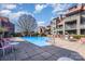 Resort-style pool, surrounded by seating, that is perfect for relaxation and entertainment at 9035 J M Keynes Dr # 33, Charlotte, NC 28262