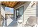 Enjoy outdoor living on this cozy balcony with seating and ample natural light at 9035 J M Keynes Dr # 33, Charlotte, NC 28262