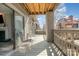 Relax on this inviting balcony with comfortable seating and scenic views at 9035 J M Keynes Dr # 33, Charlotte, NC 28262