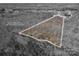 Aerial view shows approximate lot lines outlining land with mature trees and home at 944 Clear Creek Cir, Lincolnton, NC 28092