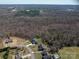 A home is nestled within a large, wooded area providing the occupants with ample privacy at 944 Clear Creek Cir, Lincolnton, NC 28092