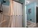 Bathroom showcases a shower/tub with shower curtain and hardware, and neutral paint at 944 Clear Creek Cir, Lincolnton, NC 28092