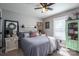 Comfortable bedroom featuring decorative bed with a headboard, a window with blinds at 944 Clear Creek Cir, Lincolnton, NC 28092