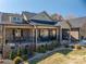 Charming brick home with a welcoming front porch and manicured landscaping at 944 Clear Creek Cir, Lincolnton, NC 28092