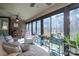 Bright sunroom with lots of windows, a ceiling fan, and wood-look floors at 944 Clear Creek Cir, Lincolnton, NC 28092