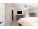 This main bedroom features neutral walls, a ceiling fan, and wood dressers at 10430 Alexander Martin Ave, Charlotte, NC 28277