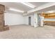 Finished basement with fireplace, utility access and space for storage at 105 Partridge Bluff Ne Dr, Concord, NC 28025
