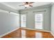 Bright bedroom with wood floors, neutral walls, and large windows that allow for ample natural light at 105 Partridge Bluff Ne Dr, Concord, NC 28025