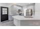 Stylish kitchen featuring stainless steel appliances, light countertops, and classic gray cabinetry at 105 Partridge Bluff Ne Dr, Concord, NC 28025