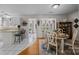 Dining area featuring a table with seating and a window overlooking the garden at 121 Yorkshire Dr, Salisbury, NC 28144