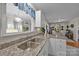 Close up on kitchen with granite countertops, a double sink, and a window looking into the dining room at 121 Yorkshire Dr, Salisbury, NC 28144