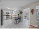 Well-lit kitchen featuring white cabinets, stainless steel appliances, and granite countertops at 121 Yorkshire Dr, Salisbury, NC 28144