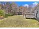 Expansive backyard with well-maintained lawn, a deck, and a storage shed at 1317 Liberty Rd, Chester, SC 29706