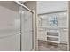 Bathroom with a sliding glass shower door and double sink vanity with stylish cabinets and a large mirror at 1317 Liberty Rd, Chester, SC 29706