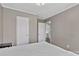 Neutrally decorated bedroom with a view into the bathroom and laundry area at 1317 Liberty Rd, Chester, SC 29706