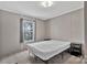 Cozy bedroom featuring neutral walls, plush carpet, and bright window views at 1317 Liberty Rd, Chester, SC 29706
