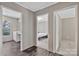 View of a hallway leading to a bathroom and bedroom, showcasing the home's layout at 1317 Liberty Rd, Chester, SC 29706
