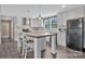 Modern kitchen boasts white cabinets, wood countertop, and stainless steel appliances at 1317 Liberty Rd, Chester, SC 29706