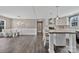 Spacious kitchen features an island with seating, pendant lighting, and modern white cabinetry at 1317 Liberty Rd, Chester, SC 29706