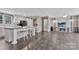 Open-concept living space flows from the kitchen with wood-look floors and neutral colors at 1317 Liberty Rd, Chester, SC 29706