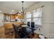 This dining room offers natural light, stylish seating, and open access to the kitchen at 1415 Mt Gallant Rd, Rock Hill, SC 29732