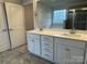 Bathroom showcasing a double sink vanity and a large mirror at 145 High Rock Ct # 03, Statesville, NC 28677