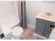 Bathroom with shower and vanity with a gray cabinet at 1606 Mt Gallant Rd, Rock Hill, SC 29732
