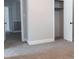 Bedroom features plush carpeting, neutral paint, and access to the closet and hall at 1606 Mt Gallant Rd, Rock Hill, SC 29732